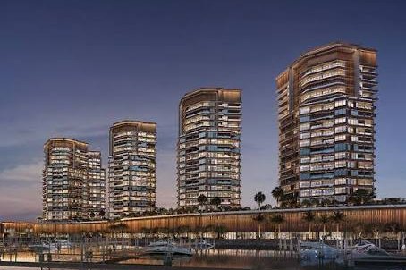 The Waterfront towers at Al Hamra, Ras Al Khaimah, seen from the marina at dusk